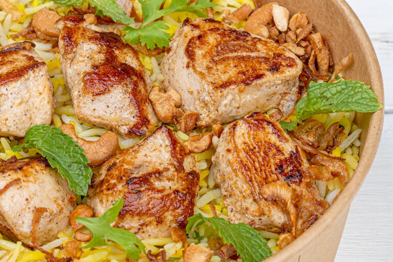 Loaded Costa Vida rice bowl with grilled chicken and guacamole